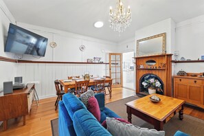 Comfort House, Bay View | Living area | 50-inch Smart TV with digital channels, DVD player, offices - Blossoms on the Bay - 4 Bedrooms (Nubeena)
