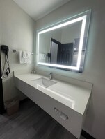 Hair dryer, towels, soap, shampoo