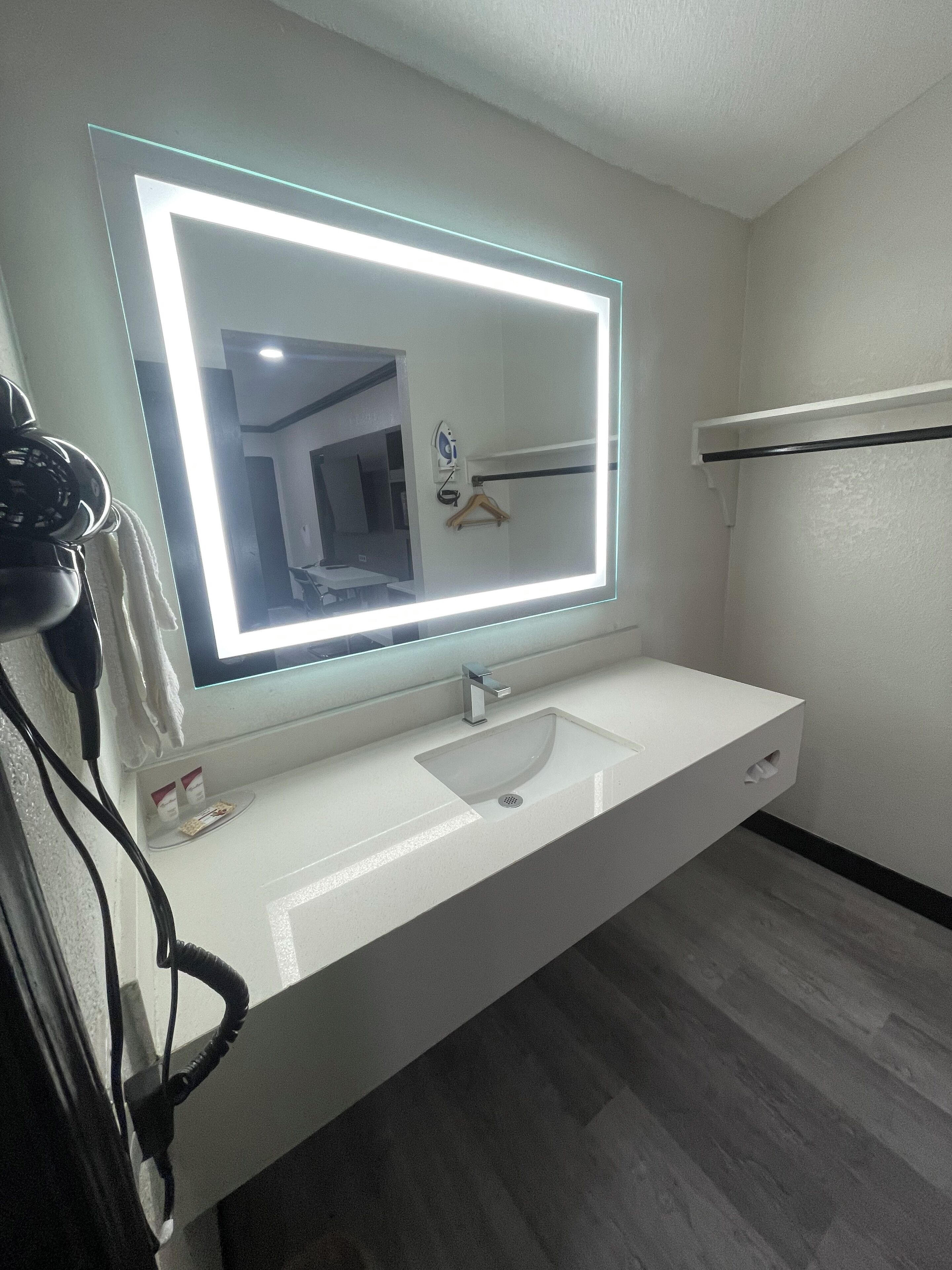 Hair dryer, towels, soap, shampoo