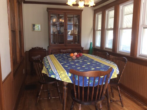 Charming 3-bedroom farmhouse with WiFi, AC.  Oldest home ON the ND campus.    