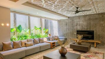 Elite Villa | Living area | 40-inch flat-screen TV with satellite channels