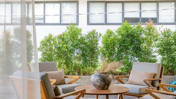 Elite Villa | Living area | 40-inch flat-screen TV with satellite channels