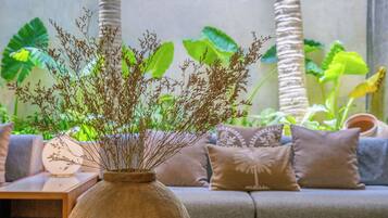 Elite Villa | Living area | 40-inch flat-screen TV with satellite channels