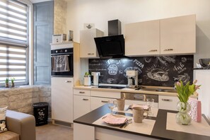 Réfrigérateur, four, plaque de cuisson, lave-vaisselle