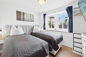 3 slaapkamers, een strijkplank/strijkijzer, gratis wifi, beddengoed