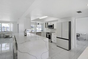 Fridge, microwave, oven, stovetop - Chic & modern canal-front retreat with private pool - Azure Tides (Punta Gorda)