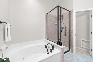 Jetted tub, hair dryer, towels, soap