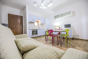 Apartment, 2 Bedrooms, Balcony | Living area | Flat-screen TV - La Casetta del Porticciolo (Pisticci)