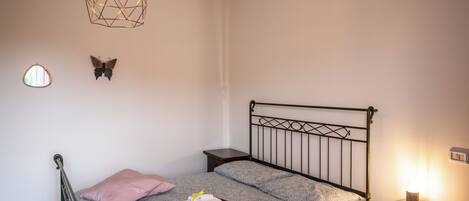 Apartment, 2 Bedrooms, Patio | 2 bedrooms, desk, iron/ironing board, free WiFi