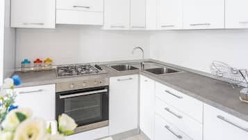 Lägenhet - 1 sovrum - uteplats | Eget kök | Kylskåp, ugn, spishäll och vattenkokare