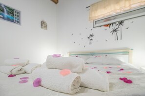 Appartement, 1 slaapkamer, terras | Een strijkplank/strijkijzer, gratis wifi