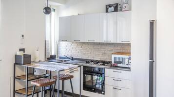 Apartment, 2 Bedrooms, Balcony | Private kitchen | Fridge, microwave, oven, stovetop