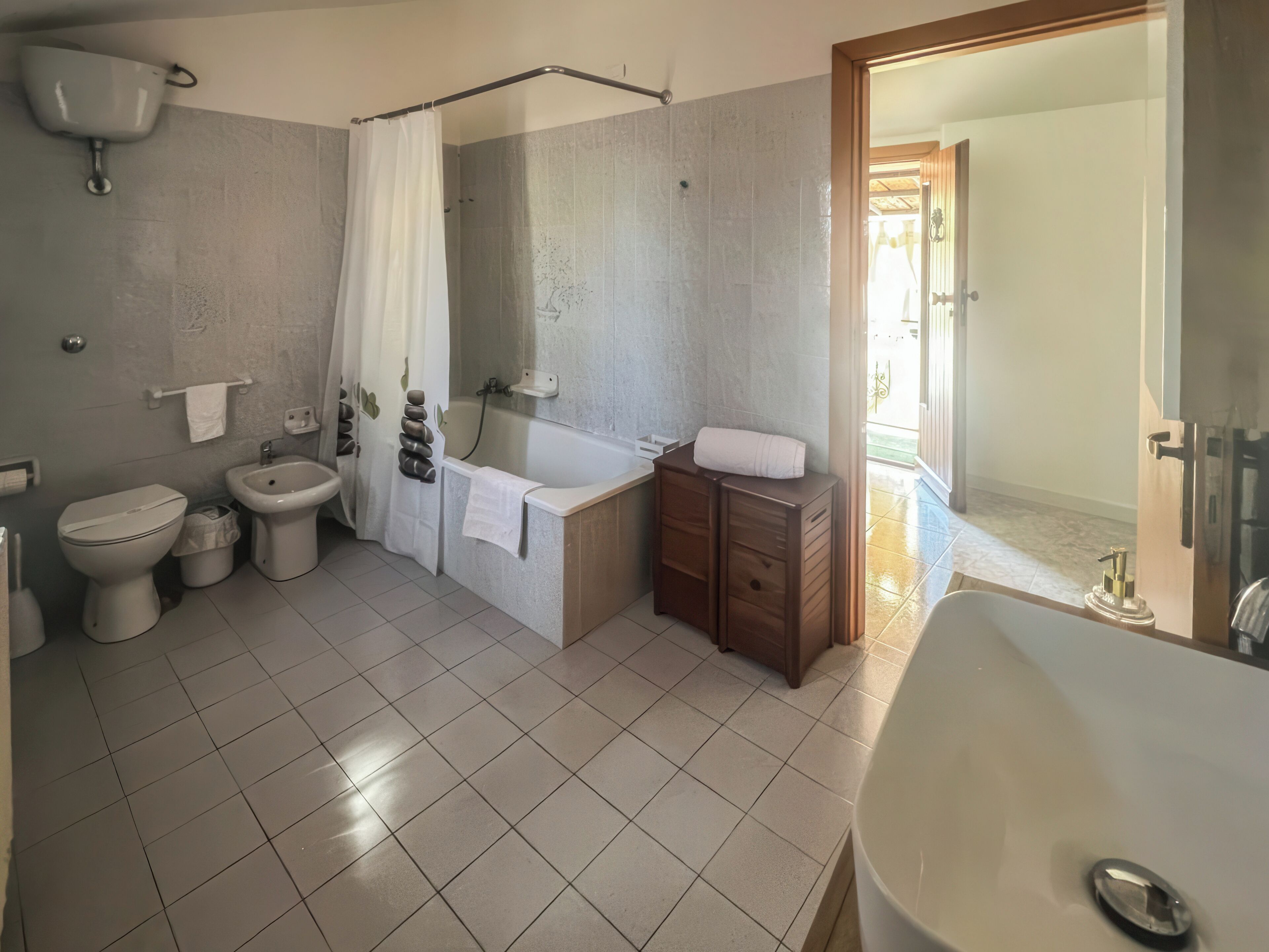 Apartment, 2 Bedrooms, Balcony | Bathroom | Separate bathtub and shower, hair dryer, towels, toilet paper