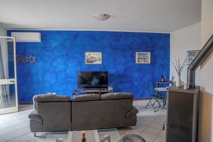 Apartment, 1 Bedroom, Non Smoking (Luna) | Living area | Flat-screen TV