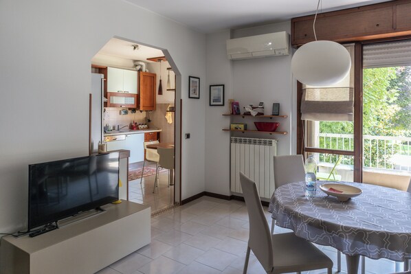 Apartment, 2 Bedrooms, Balcony | Living area | Flat-screen TV