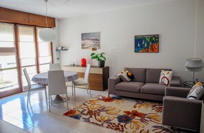 Apartment, 2 Bedrooms, Balcony | Living area | Flat-screen TV - Don Milani (Cernusco sul Naviglio)
