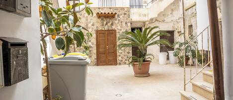 Apartment, 1 Bedroom, Courtyard Area | Terrace/patio