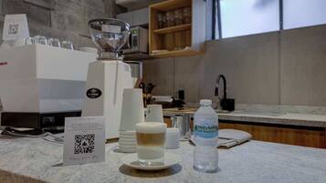 Fridge, microwave, stovetop, coffee/tea maker