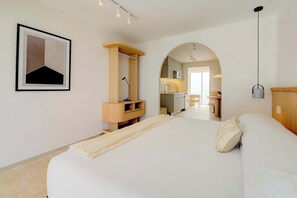 1 bedroom, desk, iron/ironing board, travel crib