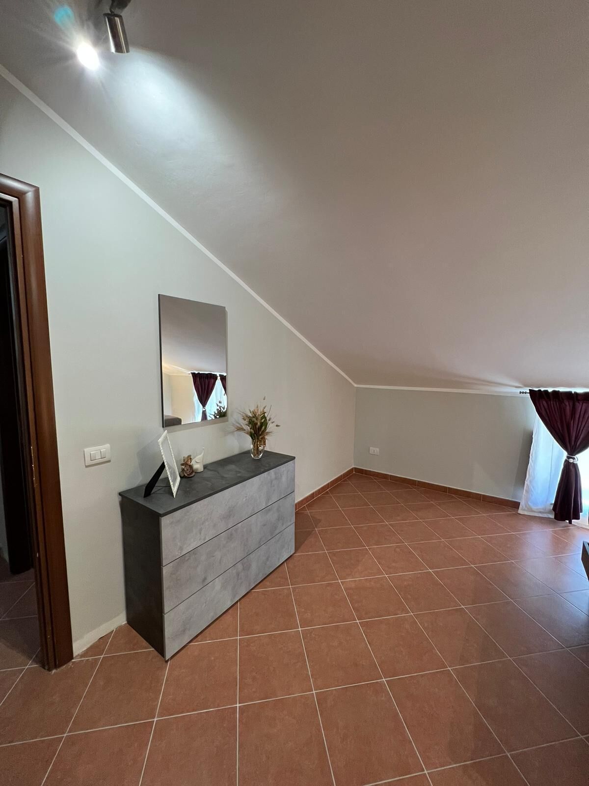 Down comforters, blackout drapes, soundproofing, iron/ironing board