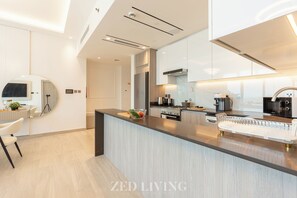 Family Apartment, 1 Bedroom | Private kitchen | Full-size fridge, microwave, electric kettle, toaster