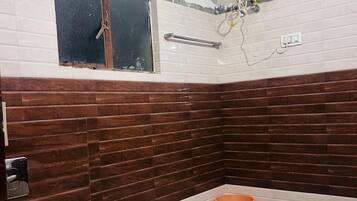 Shower, rainfall showerhead, towels, soap