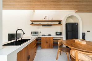 Deluxe Villa, Balcony, Pool View | Private kitchen | Coffee/tea maker, rice cooker, blender, toaster oven