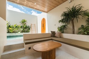 Deluxe Villa, Balcony, Pool View | Living area