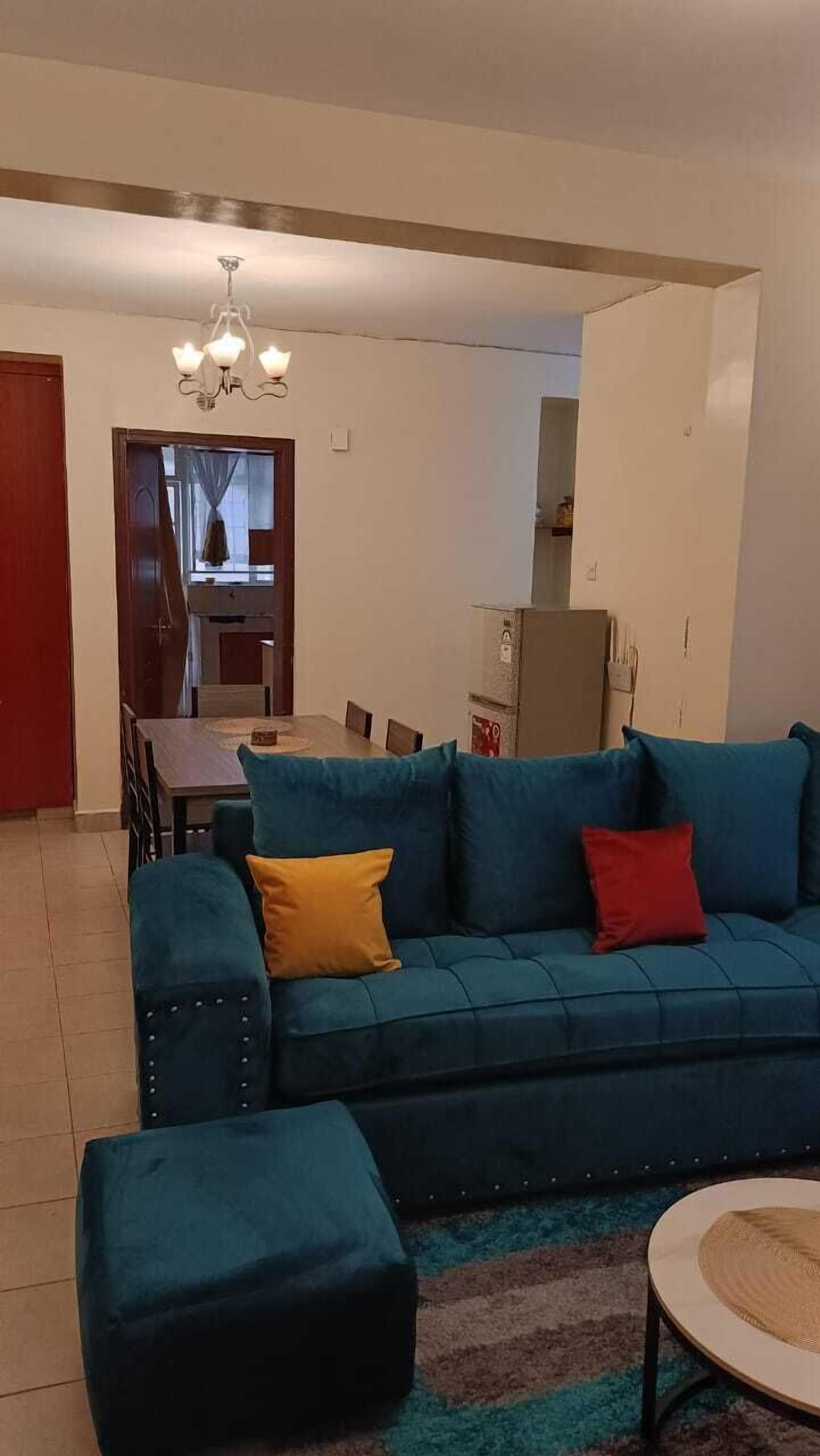 Deluxe Apartment, Balcony, City View | Living area | 24-inch Smart TV with digital channels