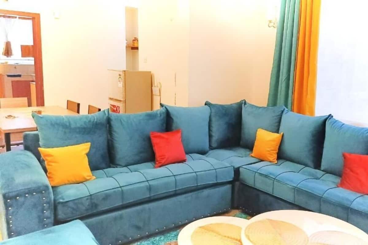 Deluxe Apartment, Balcony, City View | Living area | 24-inch Smart TV with digital channels