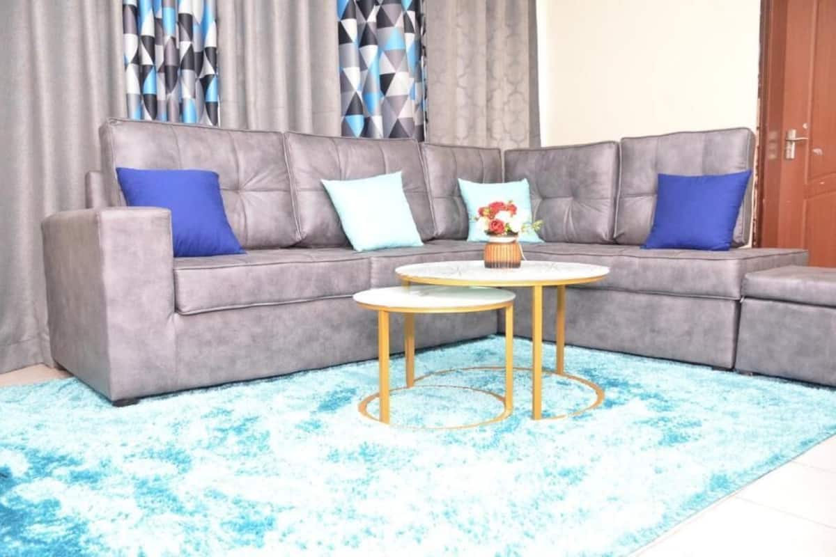 Classic Apartment, Balcony, City View | Living area | 24-inch Smart TV with digital channels