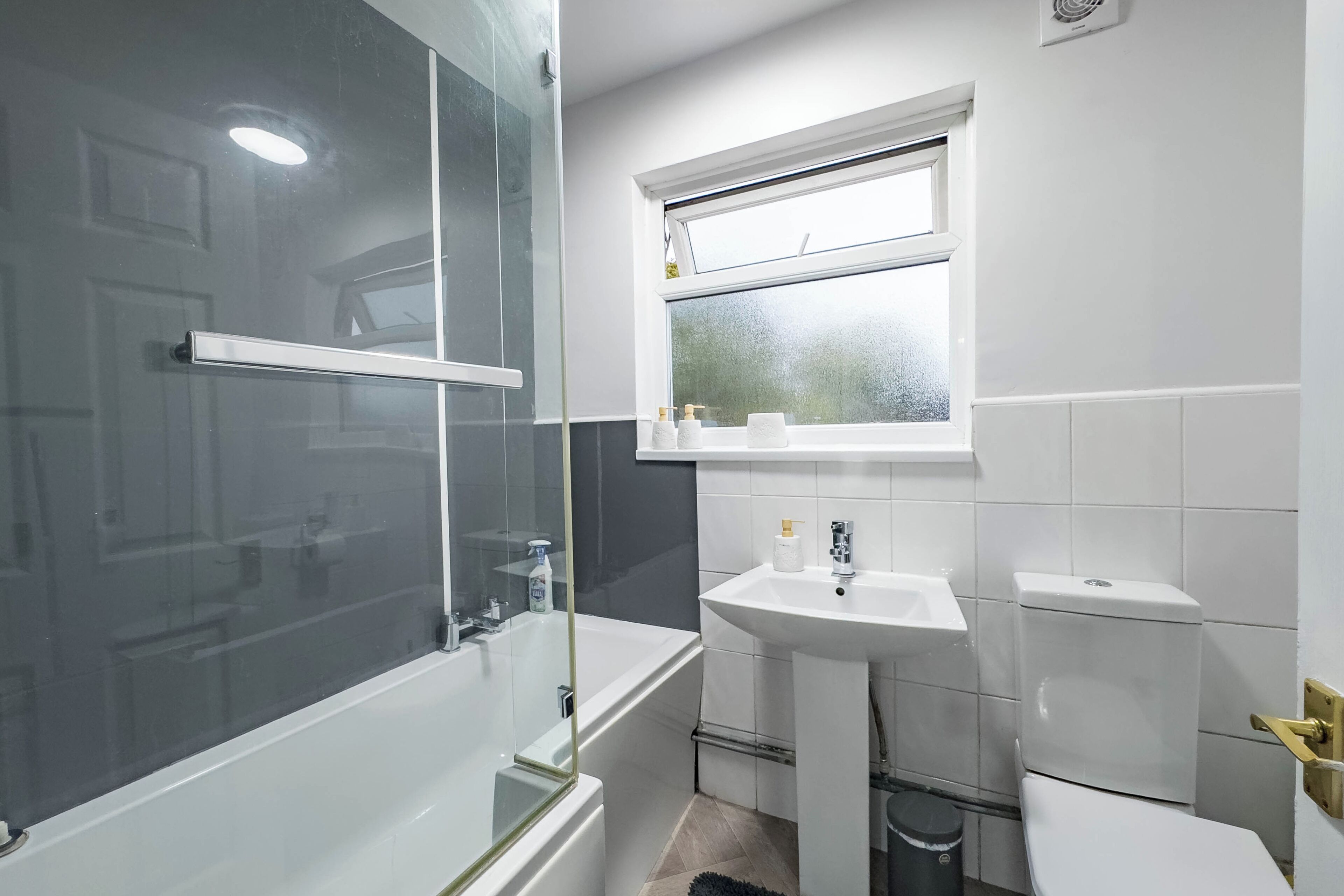 Combined shower/bathtub, deep-soaking bathtub, hair dryer, towels