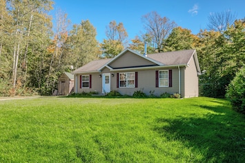 Welcome to Maple Cottage, a cozy retreat surrounded by nature, offering peace and privacy just minutes from Miller Lake.