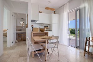 Dining - GuestHost - Modern apartment of 58 sqm located on the ground floor of a building without elevator, perfect for 4 people.The property is situated in the magnificent aquamarine residence with swimming pool and communal garden. The area is provided by all m (Pittulongu)