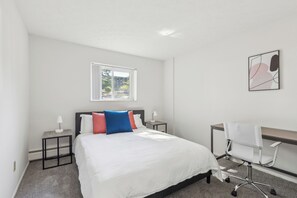 1 bedroom, desk, iron/ironing board, travel crib