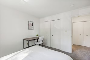 1 bedroom, desk, iron/ironing board, travel crib