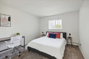 1 bedroom, desk, iron/ironing board, travel cot