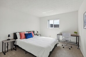 1 bedroom, desk, iron/ironing board, travel crib