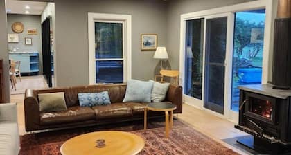 Mid century farmhouse located in the heart of Exeter Village.
