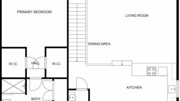 Plano de planta que muestra un dormitorio principal, sala de estar, comedor, cocina, dos baños, un vestíbulo y dos áreas tipo W.I.C. (habitaciones húmedas).