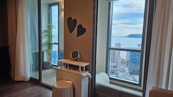 Premier Ocean View | Living area | 50-inch Smart TV with cable channels, Netflix, heated floors
