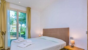 Apartamento | Cofres nos quartos, berços (sobretaxa), Wi-Fi de cortesia, roupa de cama