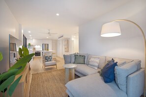 Deluxe Apartment, 2 Bedrooms, Partial Ocean View | Living area | 50-inch Smart TV with digital channels, streaming services - The Shores Surfers Paradise Apartments (Surfers Paradise)