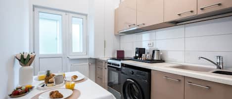 Deluxe Apartment, Balcony, City View | Private kitchen | Fridge, microwave, stovetop, coffee/tea maker