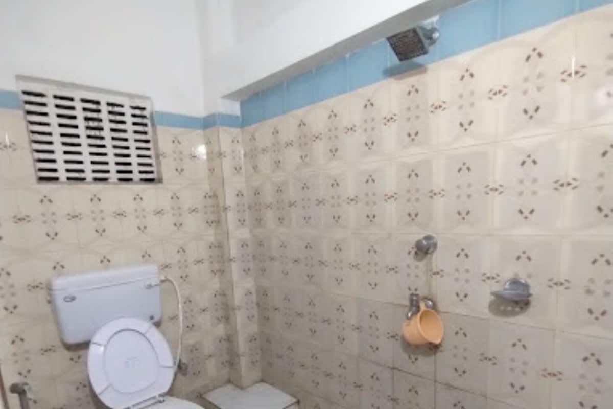 Shower, rainfall showerhead, towels, soap