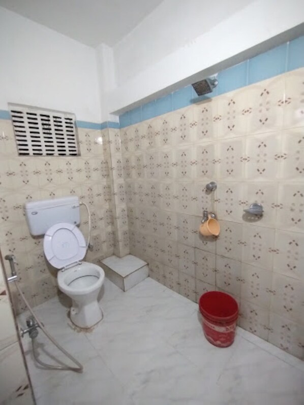 Shower, rainfall showerhead, towels, soap