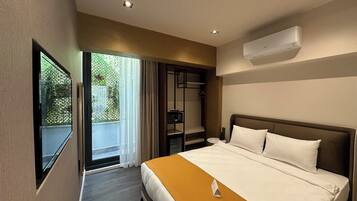 Habitación Deluxe, 1 habitación | Ropa de cama hipoalergénica y caja de seguridad en la habitación