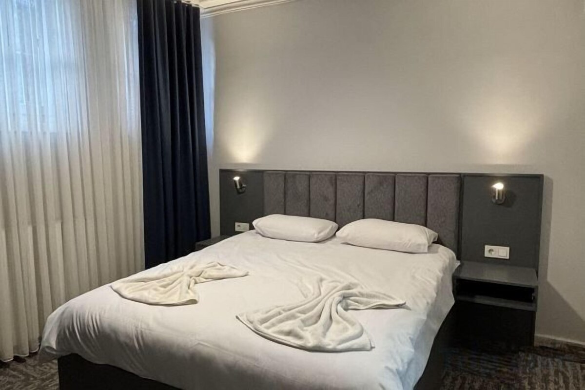 Llençols de cotó egipci, roba de llit d'alta qualitat i minibar 