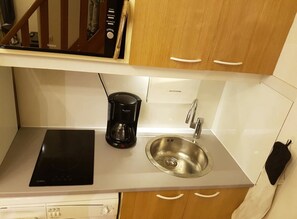 Fridge, microwave, coffee/tea maker, electric kettle
