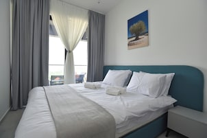 Panoramic Apartment | In-room safe, blackout drapes, soundproofing, iron/ironing board